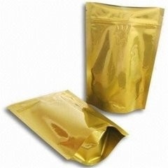 El oro se levanta la bolsa llena brillante de la hoja de la impresión que empaqueta con la cremallera