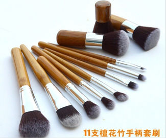 El maquillaje profesional 11PCS cepilla la madera del equipo con el bolso de la caja de la bolsa